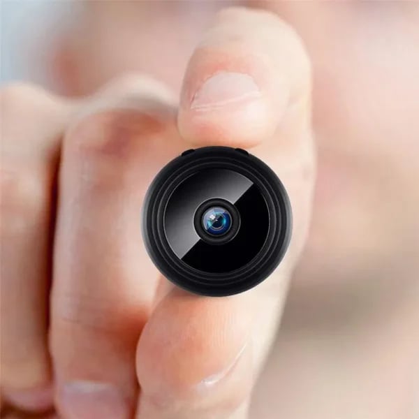 A9 Mini WiFi Smallest Camera in hand